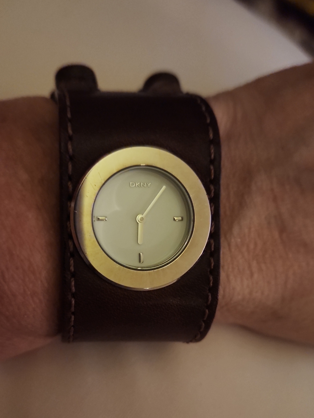 Vintage DKNY Silver-Tone Bezel Watch with Dark Brown Leather Cuff